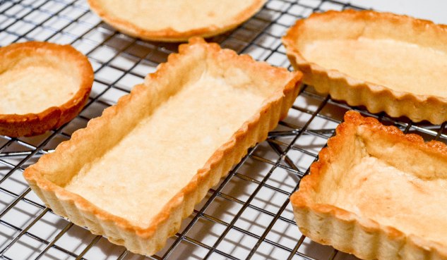 ironstone kitchen - pate brisee - baked tart shells on cooling rack